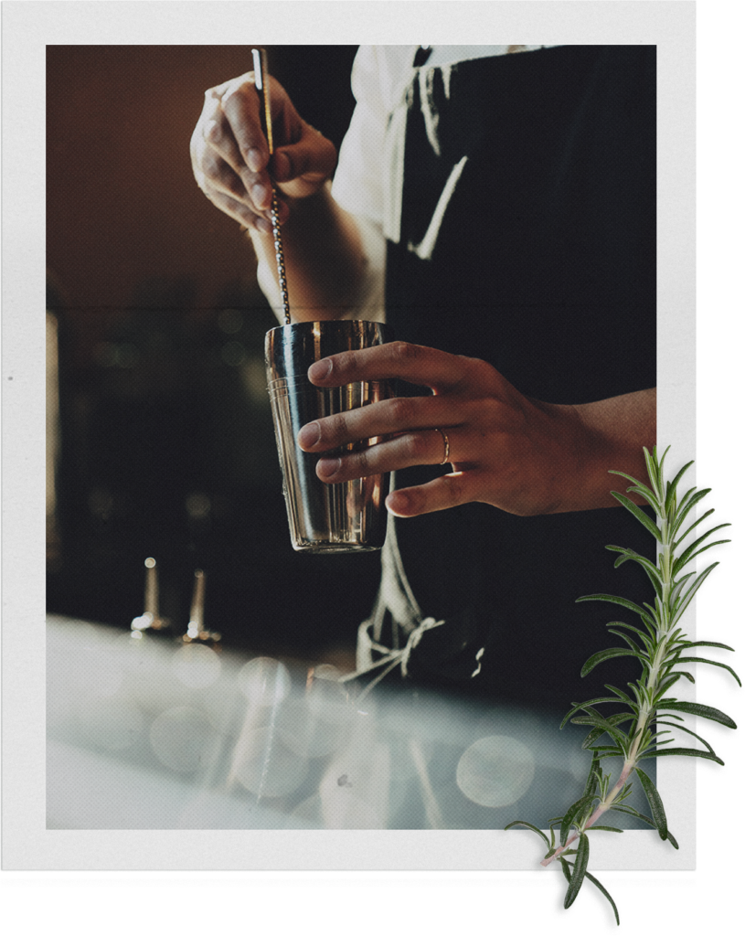 Bartender making a gin cocktail